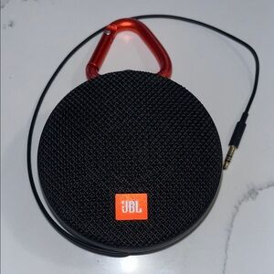 JBL Black Portable Round Bluetooth Speaker with Red Carabiner Accent